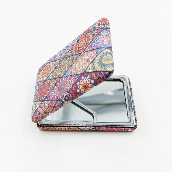 Rectangular compact mirror with multicolour diamond pattern and crystal inlay