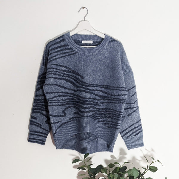 Luxury high low jumper with ripple effect design