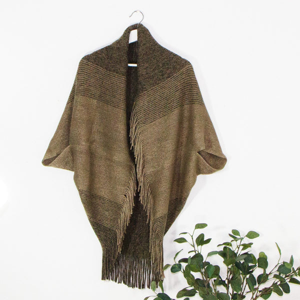 Free size poncho style cardi with tassel edging