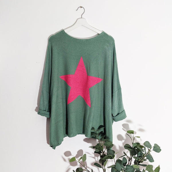 Cosy free size top with bright star motif on back