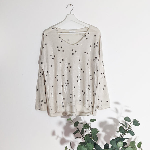 Multi star print casual top with subtle sheen