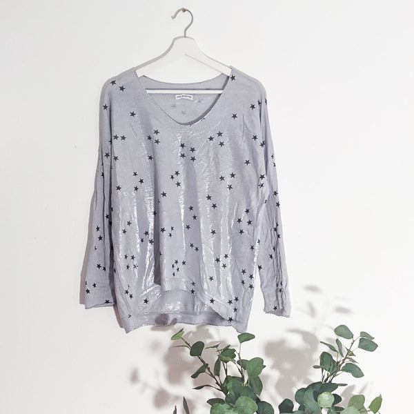Multi star print casual top with subtle sheen